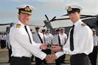 Edwin Cooper receiving the Sopwith Trophy from Rear Admiral Ben Key, FOST
