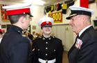 Lance Corporal Rachael Lear (centre) of 800 NAS SCC enjoying a chat with Cdre Alexander