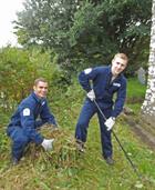 RNAS Culdrose Trainees clearing vegetation from St Mawgan in Meneage church