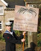 Ordinary Cadet Tristan Lane carrying the Nelson Banner, Madron parade