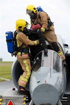 Royal Naval Aircraft Fire-fighter’s rescuing the pilot of the exercised crashed Hawk jet