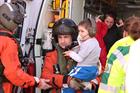 Jake being carried by Petty Officer Craig Gabraitis, Aircrewman and trainee paramedic