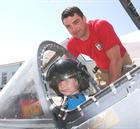 NA AH Gleeson and a future Naval aviator in the Harrier Cockpit