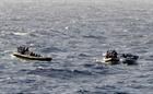 HMS Argyll sends her sea boats across to capture the crew and contraband