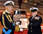 Admiral to the fleet, Lord Boyce presents Chief Petty Officer Derek Ashurst with the QCVS