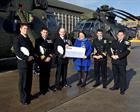 Cheque Presentation to Clare Scherer, Royal Navy and Royal Marines Children’s Fund.