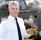 Commodore Jock Alexander OBE with Peregrine Falcon 