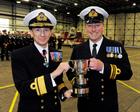 Lt Cdr Al Rogers receiving the Bambara Flight Safety trophy from Rear Admiral Russ Harding CBE
