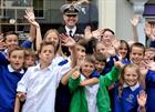 Capt Ade Orchard OBE with children of St Michael School Helston