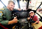  Lt Matt Taylor and Noah in Sea King cockpit