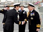 Vice Admiral Sir Philip Jones KCB being welcomed by HMS Dauntless' Commanding Officer Commander Guy.