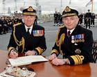 Vice Admiral Sir Philip Jones KCB (right) and the new Fleet Commander Vice Admiral Ben Key CBE signi