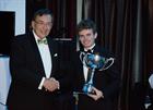 Jordan Richards presented with his trophy by David Roberts, President Europe Air Sports.