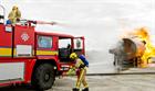 Fire Engine Monitor Pump douses the aircraft fire flames