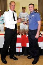 Commodore Paul Chivers OBE CO HMS Heron and AET Sam Lyndon