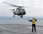 815 Lynx carrying Philip Hammond arrives HMS Bulwark