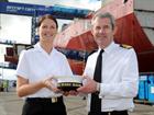 R Adm Steve Brunton and Leading Writer Claire Butler with her cap tally