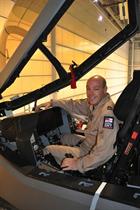 Lt Cdr IanTidball in mock-up cocpit of F-35