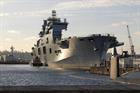 HMS Ocean moves slowly into number 10 dock at Devonport Royal Naval Dockyard to begin her refit