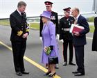 Captain Mark Garratt with the Queen and Prince Philip