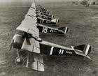 Sopwith Triplanes of the Royal Naval Air Service  lined up on airfield in France