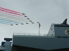 Red arrows over HMS Queen Elizabeth at the naming ceremony ©Craig Hoyle Flightglobal