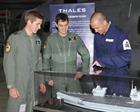 Members of 820 NAS inspecting a model of HMS Queen Elizabeth