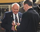 Rear Admiral Russ Harding OBE presenting the Arctic Star to Rex Little