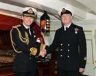Second Sea Lord Vice Admiral David Steel CBE presenting the MSM to WO1 AET Steve Cass
