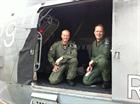 Lt Cdr ‘Chuck’ Norris RN (Left) with Flt Lt Jon Owen RAF (right) on board Sea King R193