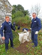 RNAS Culdrose Trainees clearing vegetation from St Mawgan in Meneage church