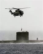 A Merlin MK 1 working with a T Class Submarine on a previous exercise