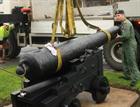 Lt AJ Allan McInnes guides the cannon onto its carriage