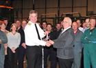 Captain Mark Garratt CO RNAS Culdrose presenting Ernie Endean with his Imperial Service medal