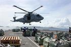 Merlin lifting aid to the Philippines