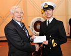 Cdr Simon Askins (FAAOA) presenting award for best AEO under training 2012-13 to Lt Mark Stone