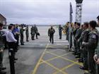 Lt Cdr Cook being met by his colleagues of 815 Naval Air Squadron 