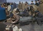 Victorious personnel fusing bombs prior to the 3 April 1944 attack on Tirpitz