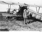 Cdr Samson in Dardanelles standing beside a single seat Nieuport 10 AWM image G00523