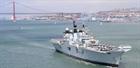 HMS Illustrious sailing in to Lisbon
