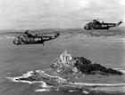 Brand-new Sea Kings pass St Michael's Mount in 1970