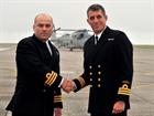 Commander Steve Thomas, right,  taking over the reigns of 824 NAS from Commander Nick Gibbons