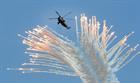 Sea King Mk4 helicopter from 845 NAS firing decoy flares
