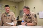 Chris (right) discusses instructor tactics with his squadron colleague Capt Todd White