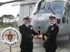 POAET Conrad ‘Con’ Williams receiving his Clasp to his LSGC medal from Cdr Stu Finn, CO of 814 NAS