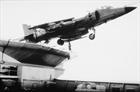 Sea Harrier taking off HMS Invincible IWM image