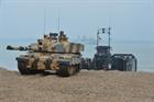 A Challenger II Tank arrives after hitching a lift on a Royal Marines Landing Craft Utility Vessel (