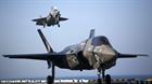 Two F-35B Lightning II Joint Strike Fighters complete vertical landings aboard the USS Wasp (LHD-1)