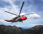 SAR Sea King over Scottish mountains from HMS Gannet