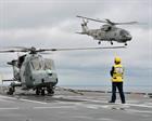 Merlin airborne ahead of Wildcat HMS Ocean 
